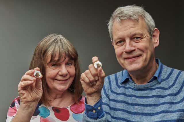 Julia Donaldson and Axel Scheffer with The Royal Mint's Gruffalo coin.