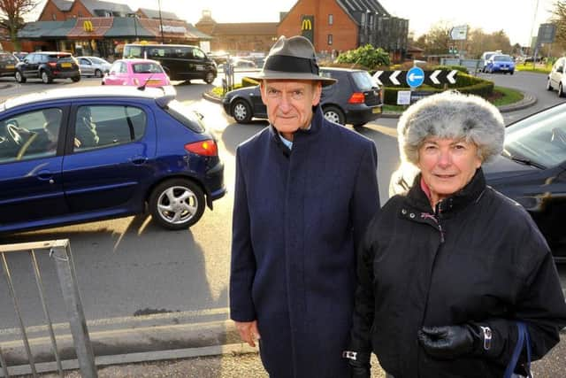 Council leader Pru Moore and councillor Richard Cherry by McDonalds. Photo by Steve Robards