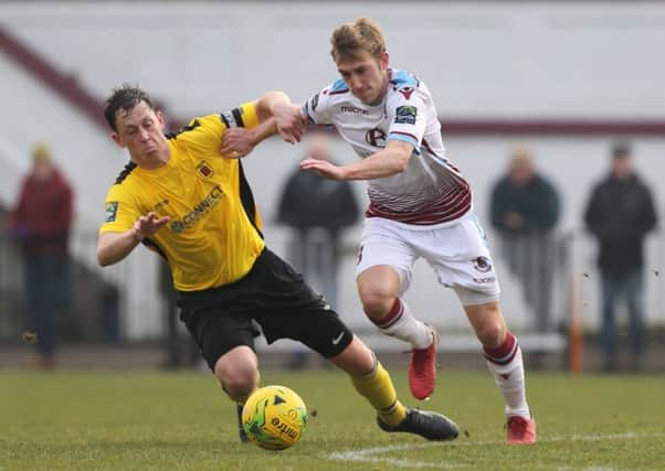 Sam Beale on the ball during Hastings United's 2-1 win at home to Faversham Town. Picture courtesy Scott White