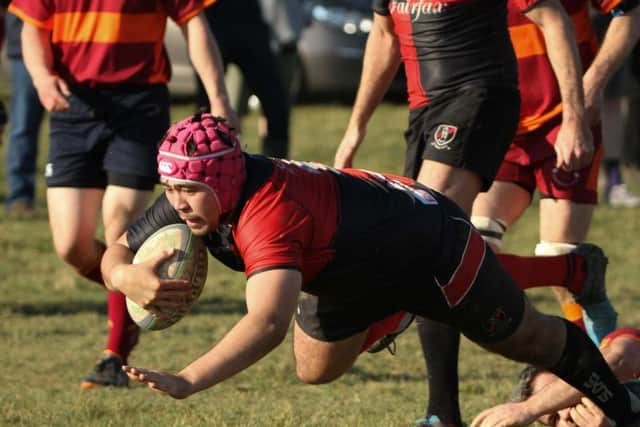 Matt Monahan crashing over for his second try of the day