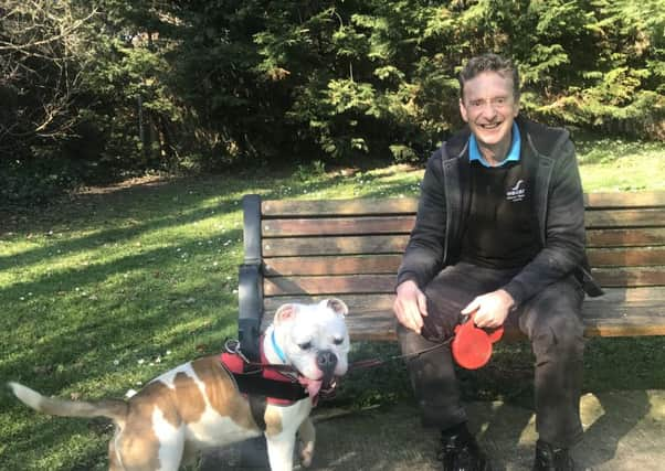 Wadars senior animal rescue officer Billy Elliot with Bobby the bulldog