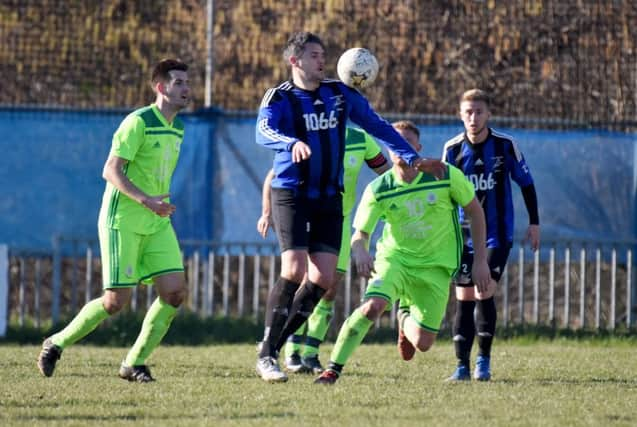 Dominic Clarke scored both of Hollington United's goals in the 2-1 win away to Buxted. Picture by Justin Lycett