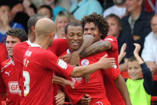 Crawley players celebrate Wes Thomas' goal against Macclesfield (Pic by Jon Rigby)