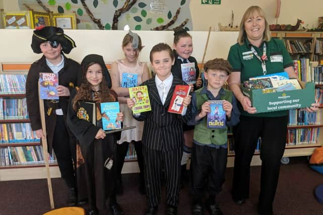 White Meadows Primary Academy in Littlehampton. Jayden Elliott as a pirate, Nikola Chmieolska as Hermione, Summer Lane as Dobby, Aston White as a gangster, Taylor Gardner as Miss Trunchbull, Harry Carn as Oliver Twist and Alison Whitburn, Morrisons Community Champion