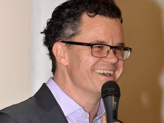 Dominic Holland