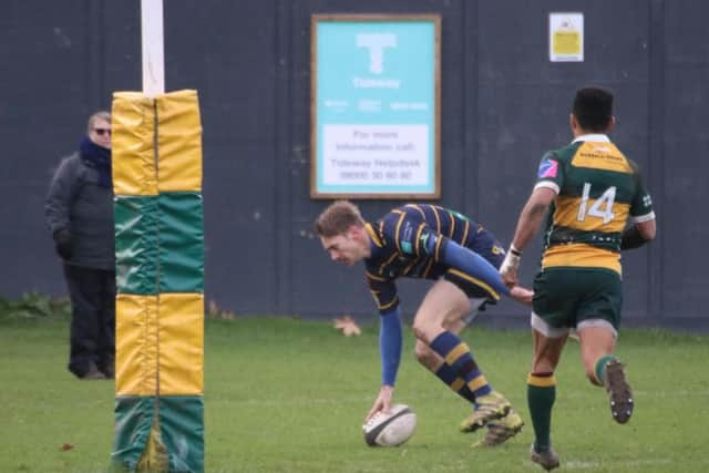 Jack Maslen goes over for Worthing Raiders at Barnes. Picture: Colin Coulson