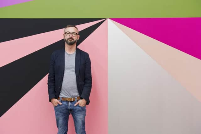 Lothar Götz, in front of his installation at the MAC Belfast . Photo - Jordan Hutchins SUS-191203-093456001