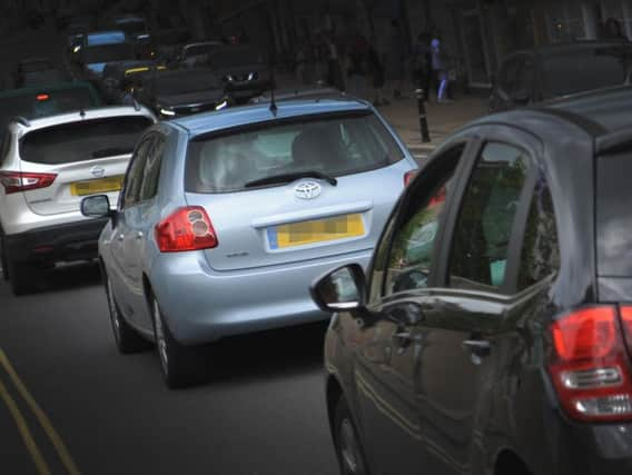 Gravel on a roundabout in Fontwell is causing delays on the A27