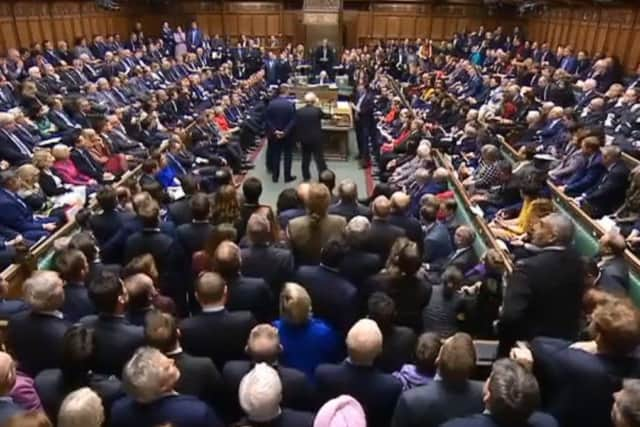 MPs wait to hear the result of a vote on Theresa May's latest Brexit deal (photo from Parliament.tv).