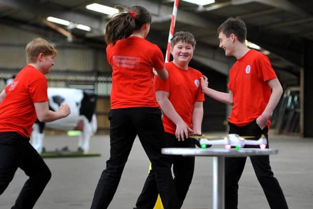 The team from Downlands Community College celebrating their drone's successful flight at the Mid Sussex STEM Challenge