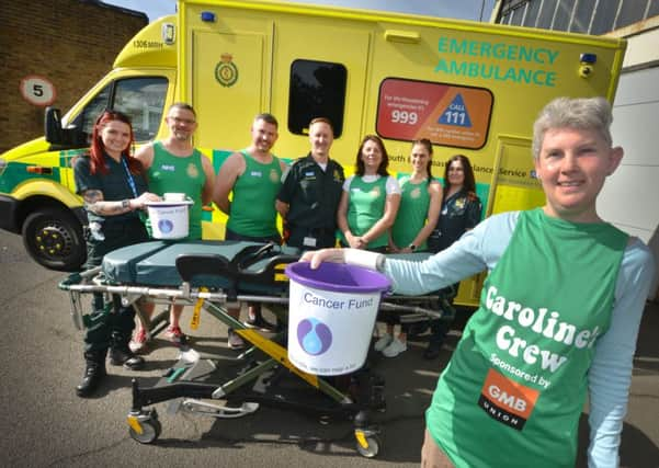 Caroline Stannard and some of the ambulance staff in Hastings who will be running the half marathon with a stretcher