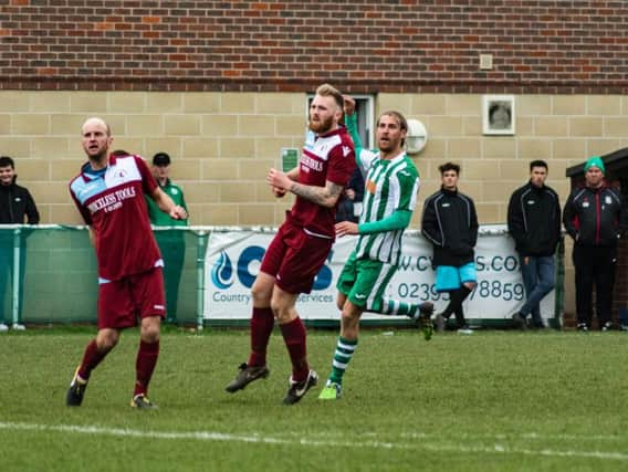 Scott Jones watches his left-foot shot go in to complete a perfect hat-trick / Picture by Daniel Harker