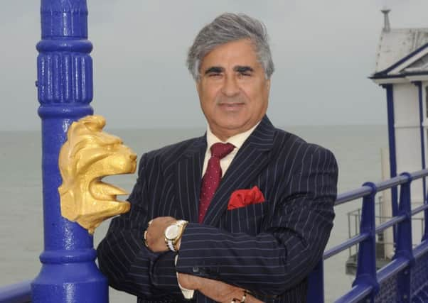 Mr Gulzar on Eastbourne Pier (Photo by Jon Rigby) SUS-160408-082816008