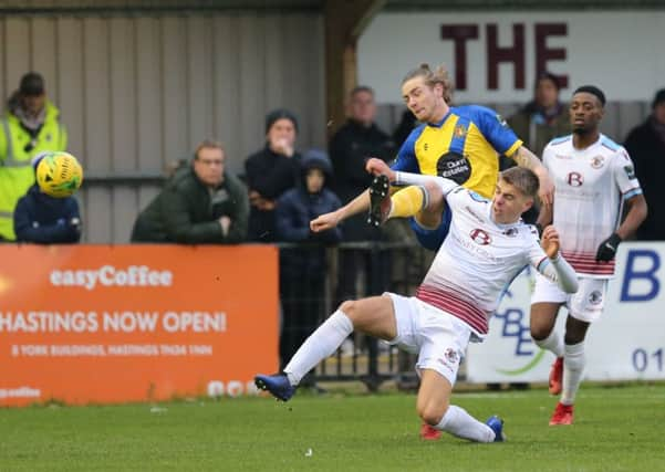 Jack Tucker slides in to a tackle during Hastings United's 5-0 win at home to Sittingbourne in January. Picture courtesy Scott White