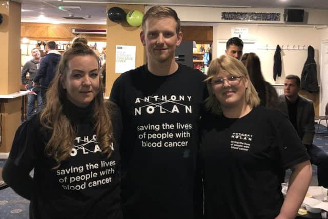 Luke McCarthy with Jo May and Kelly Greenhill, who helped by doing the scoring