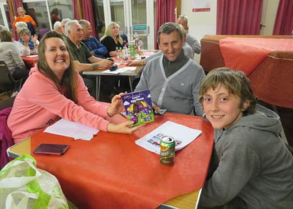 The least successful team 'The  3 Thinkers' at the Rotary Club of Senlac's quiz at Little Common Community Centre to raise funds for local good causes. SUS-190904-121255001