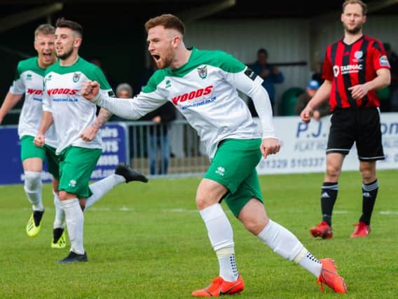 Theo Widdrington scores from the spot against Brightlingsea / Picture by Tommy McMillan