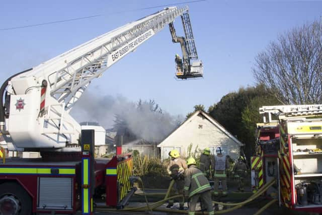 Firefighters tackle the blaze