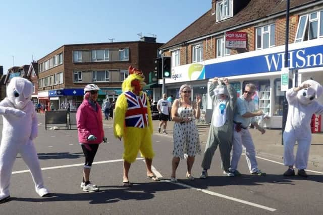 Singer Jenna Hall with her Easter-themed backing group at the market