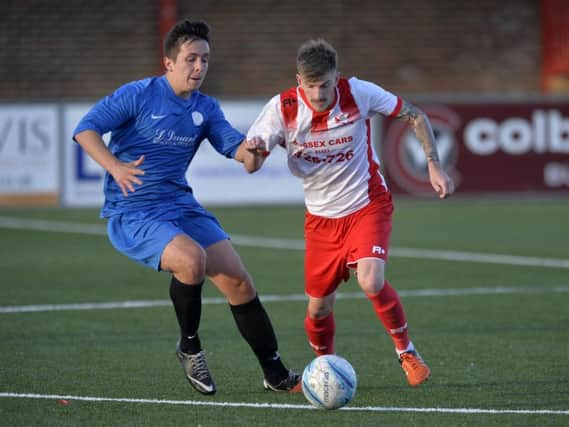 Oliie Gill (left) in action for Horsham YMCA during their 2-0 away win over Langney Wanderers back in November. Picture by Jon Rigby.