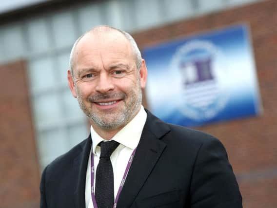 Headteacher Mark Anstiss outside the college