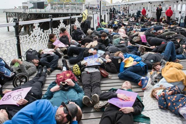 Extinction Rebellion activists at the Brighton Palace Pier (Credit: Danny Fitzpatrick)