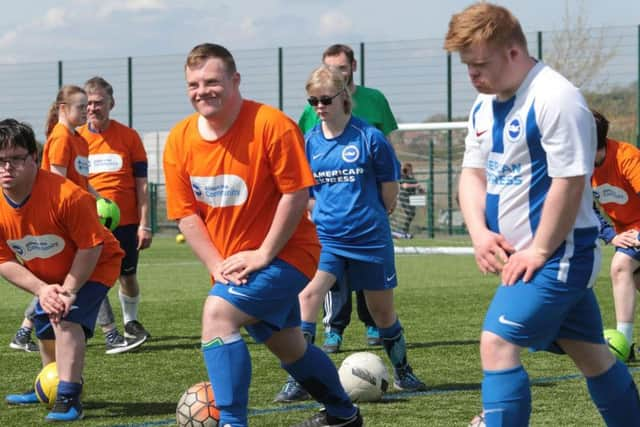 Players warming up before showcasing their football skills