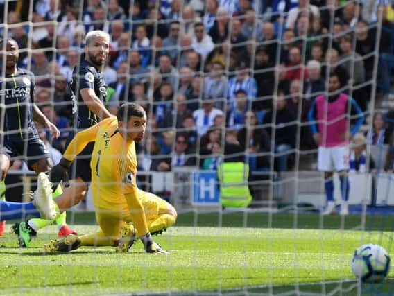 Sergio Aguero scores Manchester City's first goal past Mathew Ryan. Picture by Getty Images