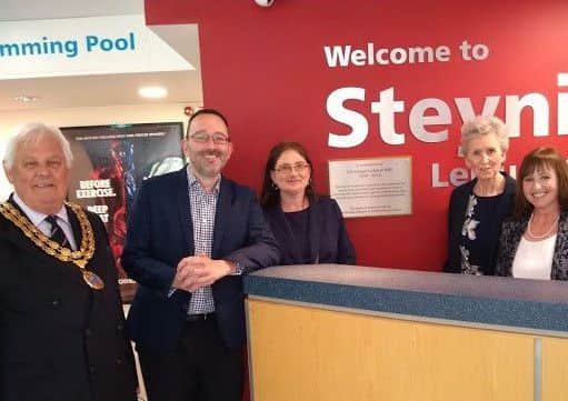 Peter Burgess, Horsham District Council chairman, with the family of the late George Cockman and former councillor Sue Rogers, who organised the plaque