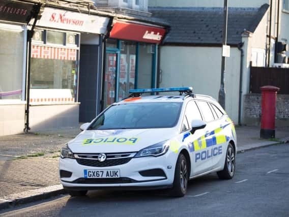 Police outside Ladbrokes following the robbery