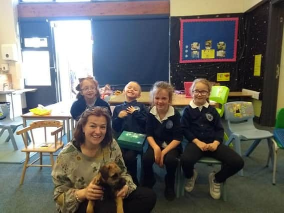 Headteacher Isabel Robson with Kirby, India Beverton, Jake Bowyer, Grace ONeill and Summer Canneaux