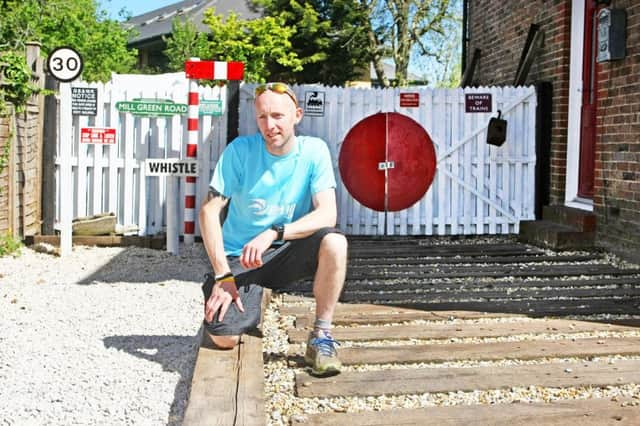 Phil Payne inhis 'station' garden. Photo by Derek Martin Photography. SUS-190514-182200008