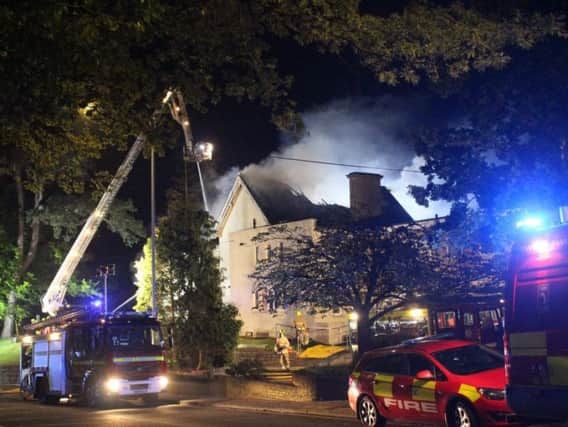 Firefighters battle the flames. Pic: Kevin Boorman