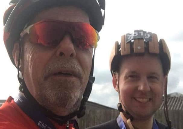 Father and son Frank and David Witcombe with their medals after finishing the race