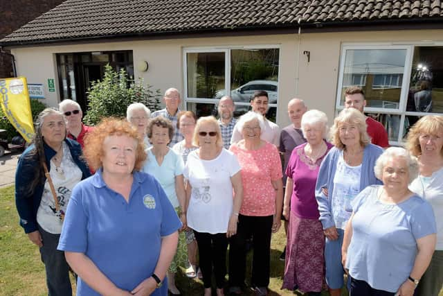 Chairman Ann Martin (front left) with members outside Milward Court in Shoreham. Photo by Kate Shemilt