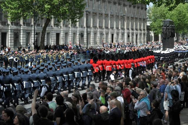 Veterans and serving military march down Whitehall past The Cenotaph during the VE Day Anniversary parade on May 10, 2015 in London  (Photo by Stuart C. Wilson/Getty Images)