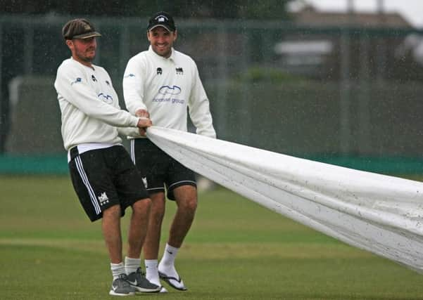 DM1961354a.jpg. Cricket: Sussex League Premier Division: Roffey v Eastbourne. Rain stops play, George Flemming, left and Theo Rivers. Photo by Derek Martin Photography. SUS-191106-162035008