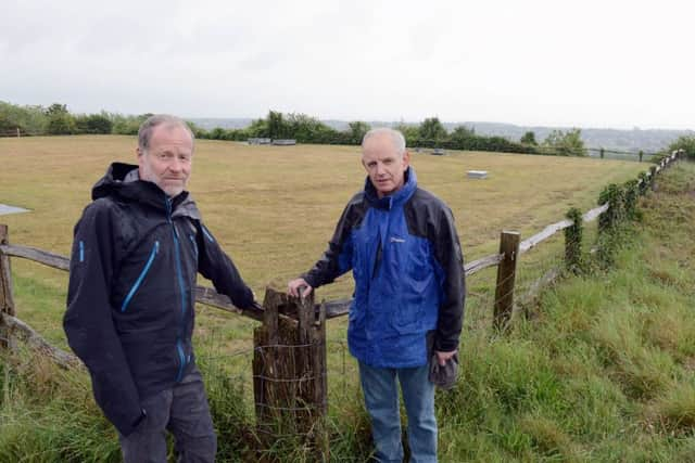 ks190301-1 Highdown Orchids phot kate
David  Bettiss, chairman of Ferring conservation, right, with Graham Tuppen, committee member by the mowed area on Highdown which was covered in orchids.ks190301-1 SUS-191006-203644008