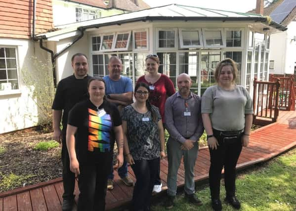 Andrew Dollard (second from right), the registered manager at the Bexhill Care Centre, with staff members