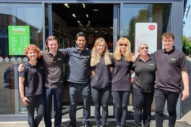 The team outside the Horsham store