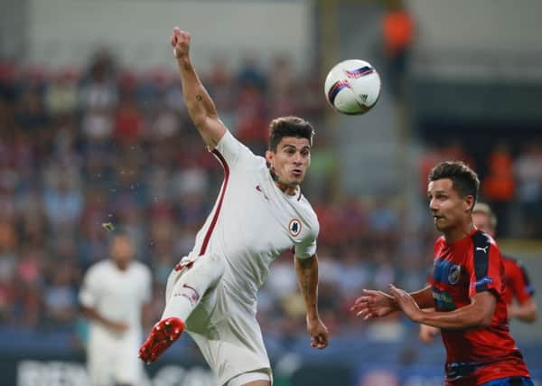 Viktoria Plzen's  Ales Mateju (R) and Roma's Diego Perotti vie for the ball during the UEFA Europa League Group E football match FC Viktoria Plzen v AS Roma in Plzen, Czech Republic on September 15, 2016. / AFP / Radek Mica        (Photo credit should read RADEK MICA/AFP/Getty Images) SUS-190107-164848002