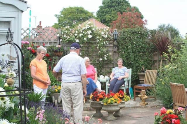 Enjoying one of the colourful gardens