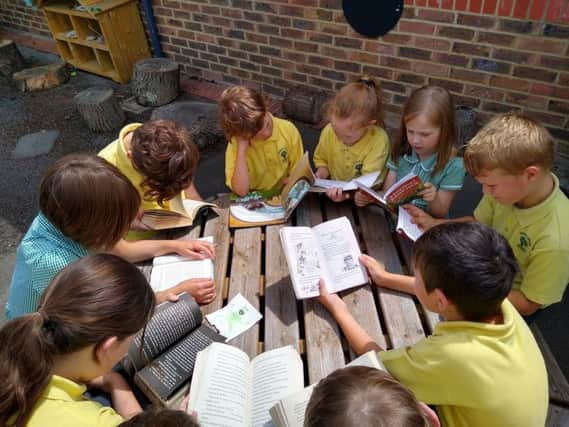 Pupils at Robsack Wood Primary Academy show us how they drop everything and read. SUS-190907-220242001