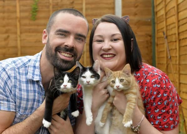 Sam and Lucy with Cherri, Toast and Marmalade (Photo by Jon Rigby)