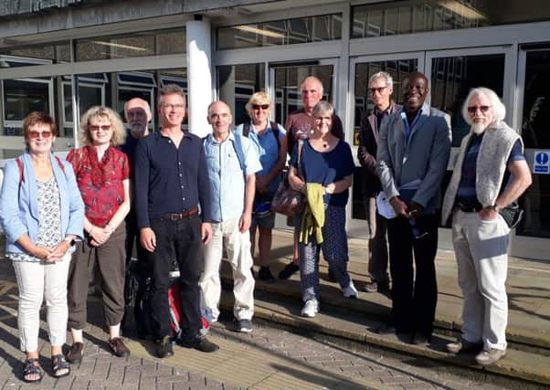 Campaigners calling for the Seaford health hub proposals to be halted by Lewes DIstrict Council, pictured before Monday's council meeting