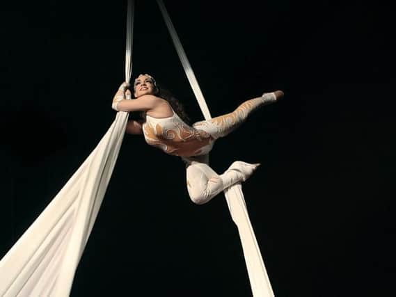 An aerial silks performance