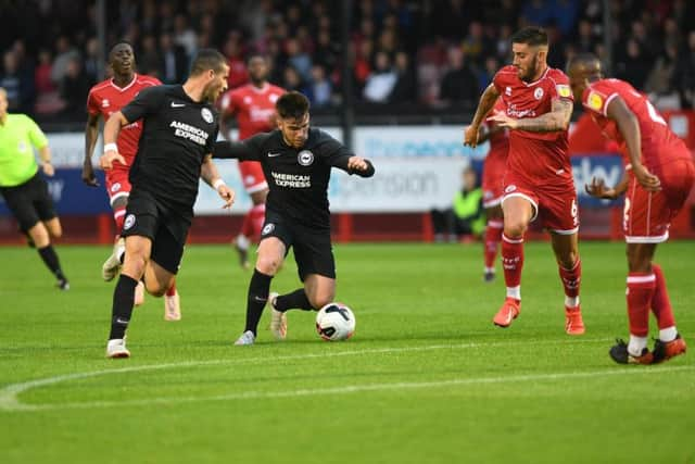 Brighton's Aaron Connolly in action against Crawley Town. Phil Westlake/ PW Sporting Photography