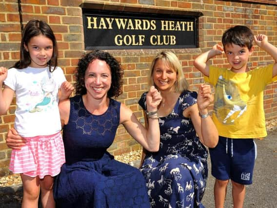 Sarah Munday with her children Emily and Tom, and Liz Evans. Photo by Steve Robards