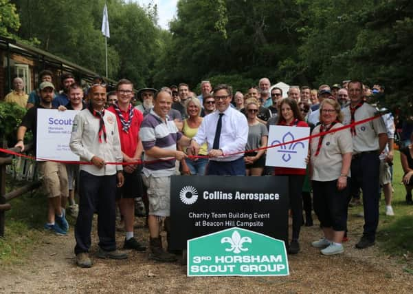 Grand re-opening of the refurbished and renovated Beacon Hill Campsite by MP Jeremy Quin with employees from Collins Aerospace, and 3rd Horsham Scout Group SUS-190730-091015001