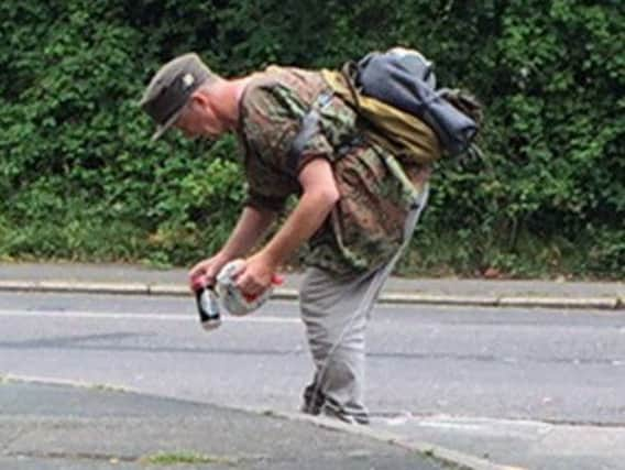 Police wish to speak to this man after some windows were smashed in St Leonards. SUS-190730-120833001